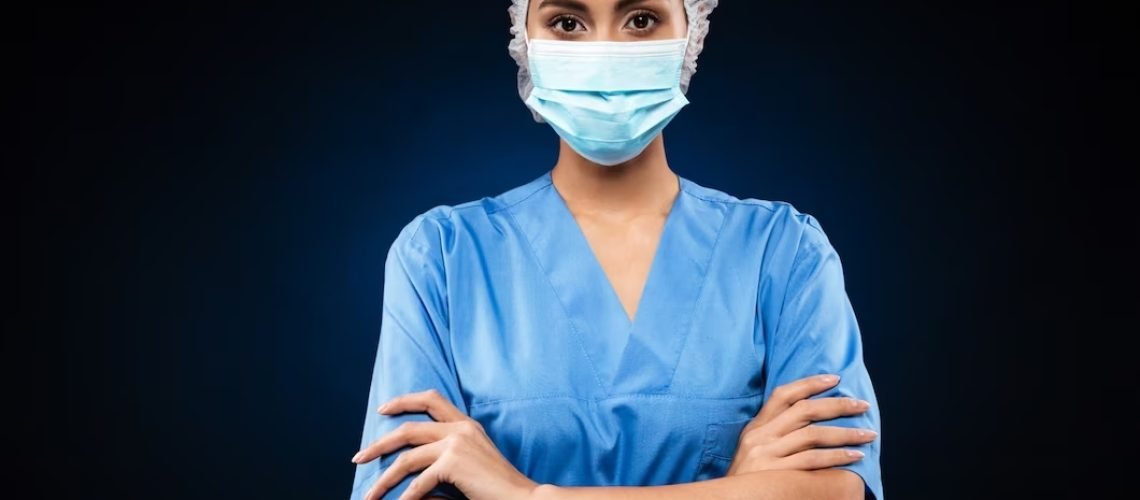 serious-doctor-medical-mask-cap-looking_171337-5807